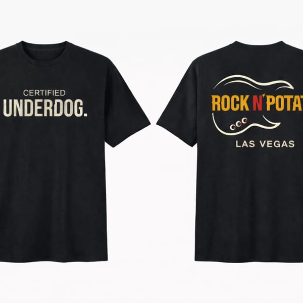 Front and back of a black t-shirt with "CERTIFIED UNDERDOG" and "ROCK N' POTATO LAS VEGAS" designs.